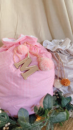 Load image into Gallery viewer, Baby pink gingham Santa sack - preorder
